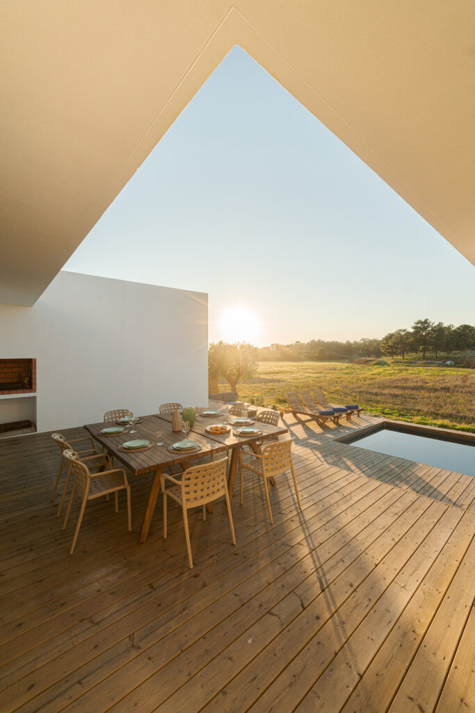 Dinner table setting in modern villa terrace